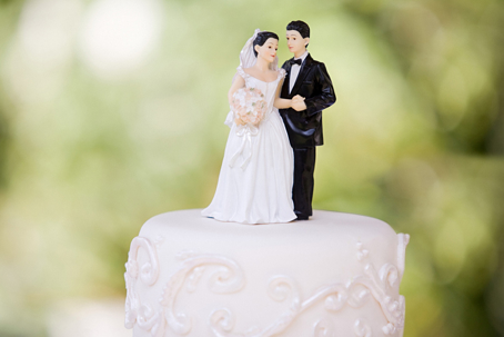 bride and groom topper on a wedding cake